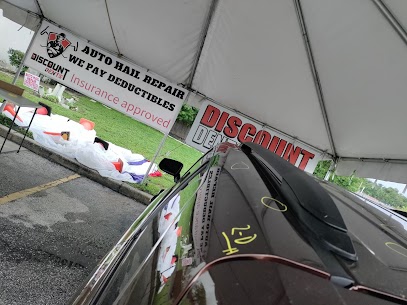 Vehicle with visible hail dents ready for repair help in the Ormond Beach area